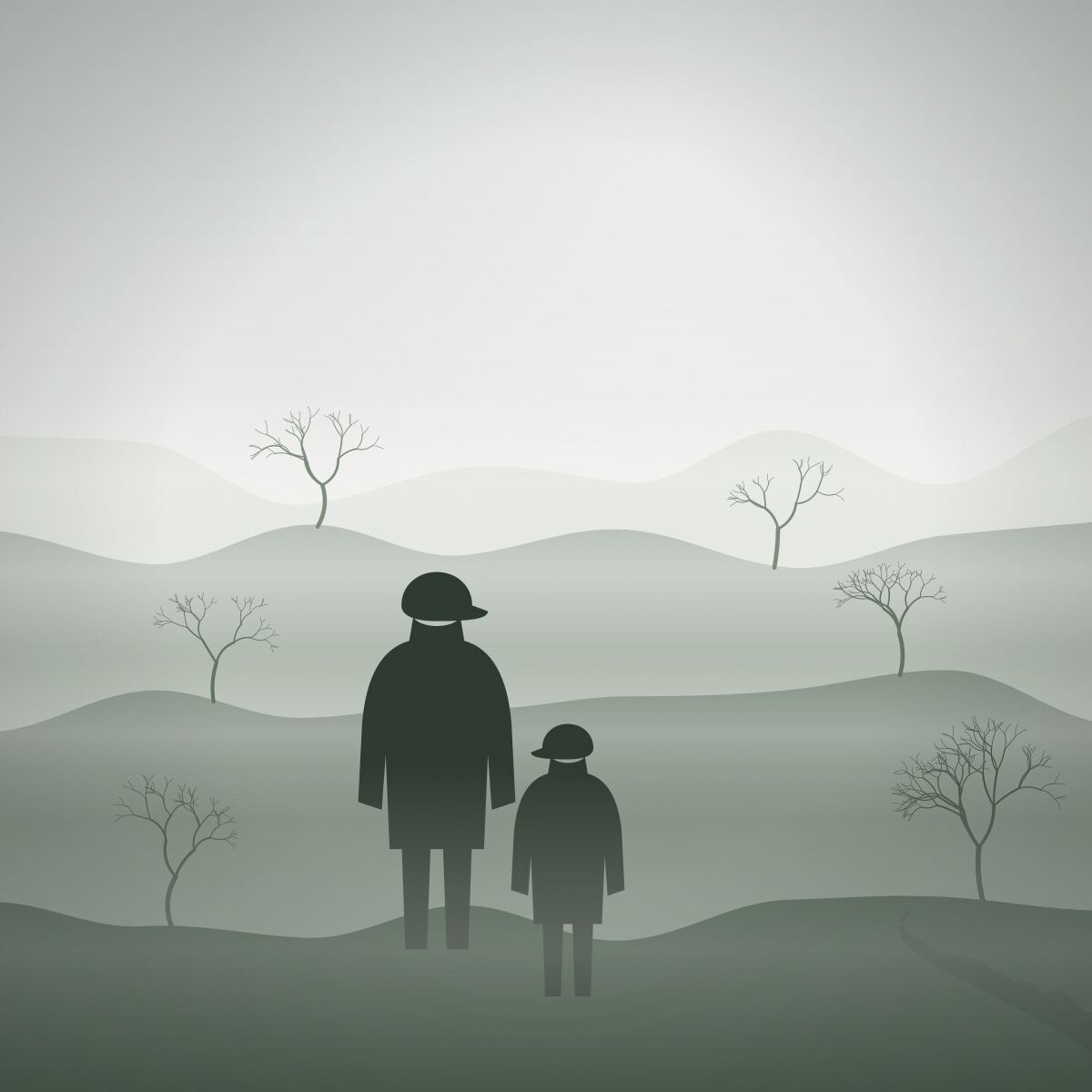 A family out in the fields on a frosty day.
